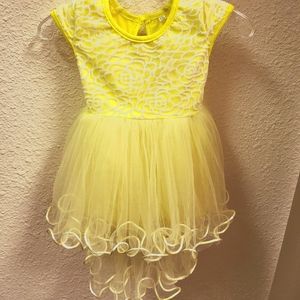 BRAND NEW BOUTIQUE! Formal yellow tulle and lace hi-low dress